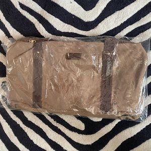NWOT tan canvas duffel bag
